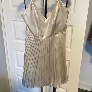 Guess Marciano Silver dress in size 4. Worn only once! In perfect condition.